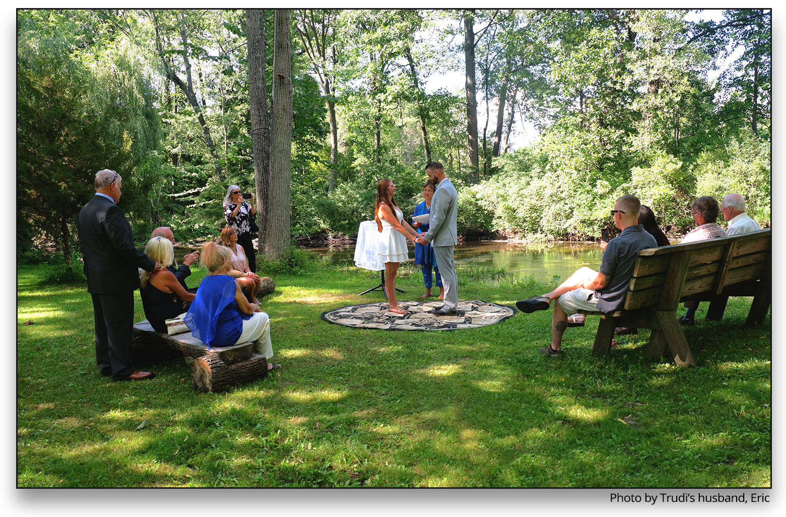 Outdoor summer wedding by the Raisin River