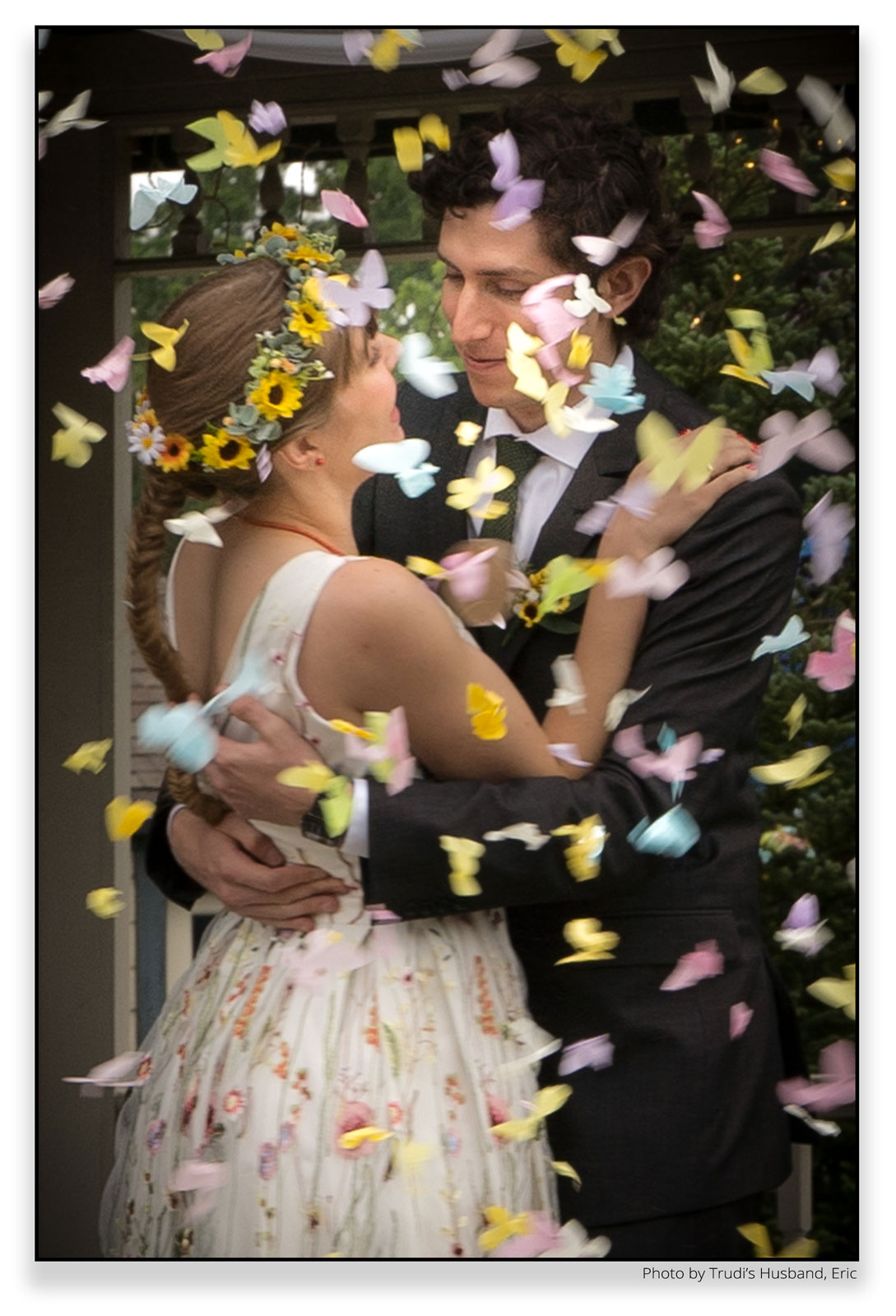 With Butterflies, Wedding couple image at a wedding by Trudi Cooper, Wedding Officiant, Jackson County, MI